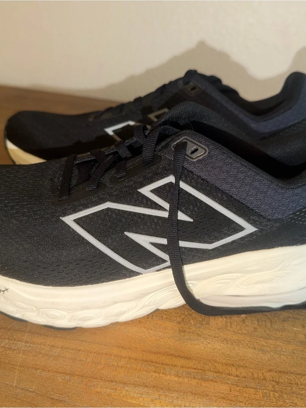New Balance Men’s Black Athletic Shoes with White Midsole